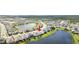 Aerial view of a single Gathering home in a lakefront community at 12665 Promenade Estates Blvd, Sarasota, FL 34238