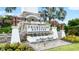 Community entrance with stonework and water feature at 12665 Promenade Estates Blvd, Sarasota, FL 34238