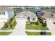 One story house with a lake view and solar panels at 12665 Promenade Estates Blvd, Sarasota, FL 34238