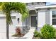 House exterior with stone accents and landscaping at 12665 Promenade Estates Blvd, Sarasota, FL 34238