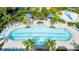 Relaxing community pool with plenty of lounge chairs at 12665 Promenade Estates Blvd, Sarasota, FL 34238