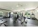 Well-equipped fitness center with treadmills, weight machines and rower at 9861 50Th Street E Cir, Parrish, FL 34219