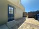 Back patio with access to the backyard and storage area at 2712 Galleon Pl, Sarasota, FL 34235