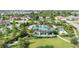 Community pool and surrounding landscape with walking paths at 2508 Avolet Ct, Bradenton, FL 34211