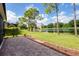 Beautiful backyard patio with a serene water view, ideal for outdoor enjoyment and relaxation at 11492 Dancing River Dr, Venice, FL 34292