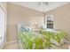 Bright bedroom featuring two twin beds, a window with natural light, and neutral walls at 11492 Dancing River Dr, Venice, FL 34292