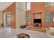 Spacious living room with high ceilings, large windows, and access to the outdoor space offers style and comfort at 11492 Dancing River Dr, Venice, FL 34292