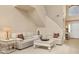 Inviting living room features neutral tones, comfortable seating, and bright natural light for a warm ambiance at 11492 Dancing River Dr, Venice, FL 34292