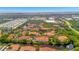 Aerial view of a community with lush landscaping, water features, and convenient location at 4126 Central Sarasota Pkwy # 2026, Sarasota, FL 34238