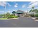 Community clubhouse with landscaping and circular drive at 6904 Drewrys Blf # 803, Bradenton, FL 34203