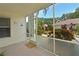 Peaceful screened porch with access to backyard and landscaping at 6904 Drewrys Blf # 803, Bradenton, FL 34203