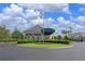 Community clubhouse with landscaping and circular drive at 6904 Drewrys Blf # 803, Bradenton, FL 34203
