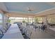 Spacious indoor lounge with large tables and seating at 6904 Drewrys Blf # 803, Bradenton, FL 34203