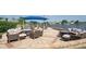Relaxing patio furniture with fire pit and seating at 6904 Drewrys Blf # 803, Bradenton, FL 34203