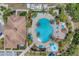 Resort-style pool with ample deck space and surrounding landscaping at 11492 Dancing River Dr, Venice, FL 34292
