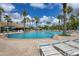 Inviting pool area with plenty of lounge chairs at 11492 Dancing River Dr, Venice, FL 34292