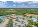 Community features including pool, tennis courts, and playground at 11492 Dancing River Dr, Venice, FL 34292