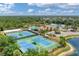 Well-maintained tennis courts near community amenities at 11492 Dancing River Dr, Venice, FL 34292