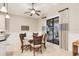 Breakfast nook with glass table and wicker chairs, access to outdoor patio at 5234 Castello Ln, Lakewood Ranch, FL 34211