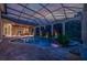 Enclosed pool and spa area with outdoor seating at 3218 Signet Ct, Sarasota, FL 34240