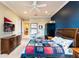 Bright bedroom with a king-size bed and large dresser at 3218 Signet Ct, Sarasota, FL 34240