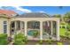 Resort-style pool and spa with screened enclosure at 3218 Signet Ct, Sarasota, FL 34240