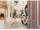Grand living room with high ceilings and elegant decor at 3218 Signet Ct, Sarasota, FL 34240