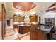 Gourmet kitchen with large island and high-end appliances at 3218 Signet Ct, Sarasota, FL 34240