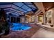 Expansive pool and spa with covered patio at 3218 Signet Ct, Sarasota, FL 34240