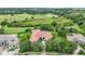 High-angle view of large home on a golf course community at 3218 Signet Ct, Sarasota, FL 34240