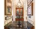 Wet bar with granite countertop and wine storage at 3218 Signet Ct, Sarasota, FL 34240