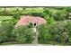 Bird's-eye view of home on golf course with lush landscaping at 3218 Signet Ct, Sarasota, FL 34240