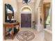 Elegant entryway with ornate details and a mosaic floor at 3218 Signet Ct, Sarasota, FL 34240