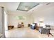 Bright living room features recessed ceilings, tile floors, and a wall of windows offering ample natural light at 15923 29Th E St, Parrish, FL 34219