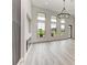 Living room showcasing natural light, fireplace, and modern aesthetic at 13457 Drysdale Ave, Port Charlotte, FL 33981