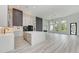 Modern kitchen with large island and white quartz countertops at 13457 Drysdale Ave, Port Charlotte, FL 33981