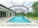 Inviting, refreshing pool with screened enclosure and spacious patio at 13457 Drysdale Ave, Port Charlotte, FL 33981