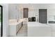Modern kitchen with large island and sleek cabinetry at 13457 Drysdale Ave, Port Charlotte, FL 33981