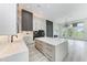 Modern kitchen with quartz countertops, stainless steel appliances, and ample cabinetry at 13457 Drysdale Ave, Port Charlotte, FL 33981