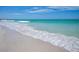 Beautiful beach with white sand and clear water at 162 Emerson Dr, Sarasota, FL 34236