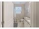 Well-maintained bathroom with a shower, toilet, and vanity with granite countertop at 12710 Sorrento Way # 101, Bradenton, FL 34211