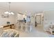 Inviting kitchen and breakfast bar with granite countertops and pendant lighting at 12710 Sorrento Way # 101, Bradenton, FL 34211