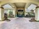 Welcoming entrance with manicured landscaping and elegant architectural details at 546 Fallbrook Dr, Venice, FL 34292