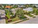 Aerial view of house and neighborhood with lush landscaping at 4735 Halyard Dr, Bradenton, FL 34208