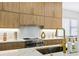 Luxury kitchen with marble countertops and gold fixtures at 2170 Fruitville Rd, Sarasota, FL 34237