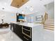 Modern kitchen with marble countertops, stainless steel appliances, and sleek cabinetry at 2170 Fruitville Rd, Sarasota, FL 34237