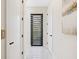 Bright entryway with modern blinds and marble floors at 2170 Fruitville Rd, Sarasota, FL 34237