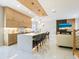 Open concept kitchen with marble island and modern appliances at 2170 Fruitville Rd, Sarasota, FL 34237