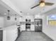 Modern kitchen with white cabinets and stainless steel appliances at 430 Tanager Rd, Venice, FL 34293