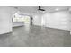 Spacious living area with open floor plan and kitchen view at 430 Tanager Rd, Venice, FL 34293